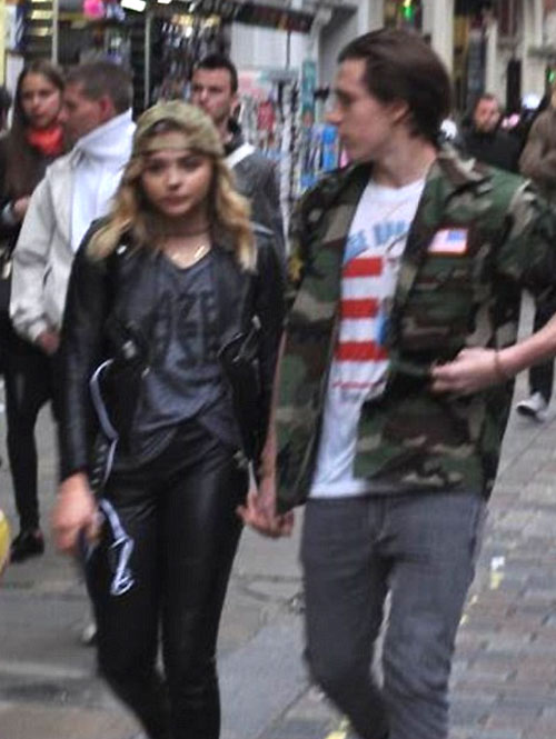 Image of Brooklyn Beckham and Chloe Moretz holding hands