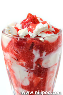 Picture of Eton mess dessert with strawberry coulis