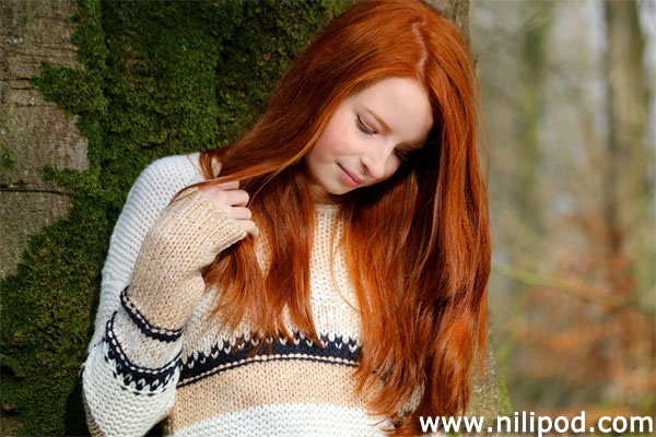 Photo of girl with long red hair