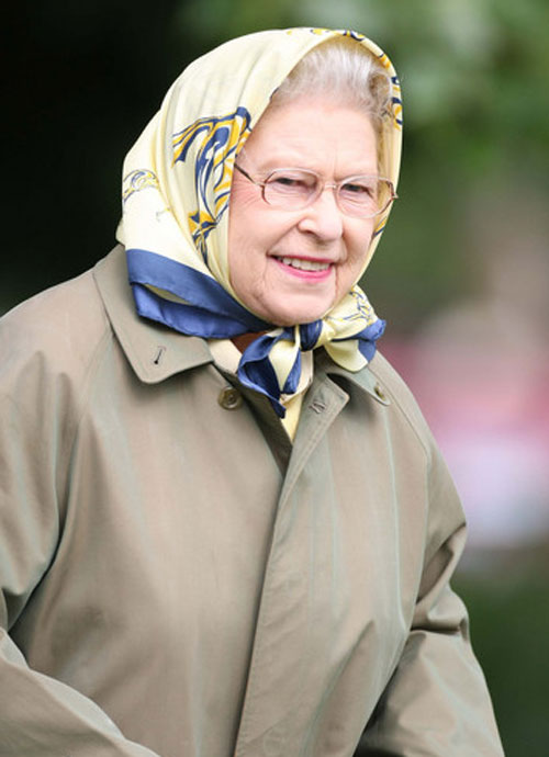 Picture of the Queen wearing a headscarf