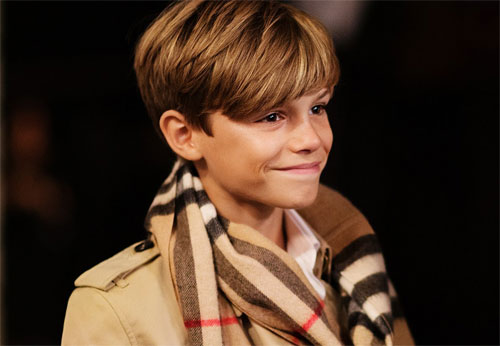 Photo of Romeo Beckham wearing a Burberry scarf