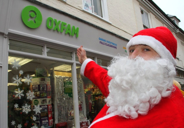Photo of Santa Claus outside Oxfam charity shop